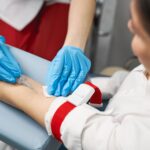 be-afraid-competent-medical-worker-wearing-sterile-gloves-while-doing-injection-her-patient-1-min